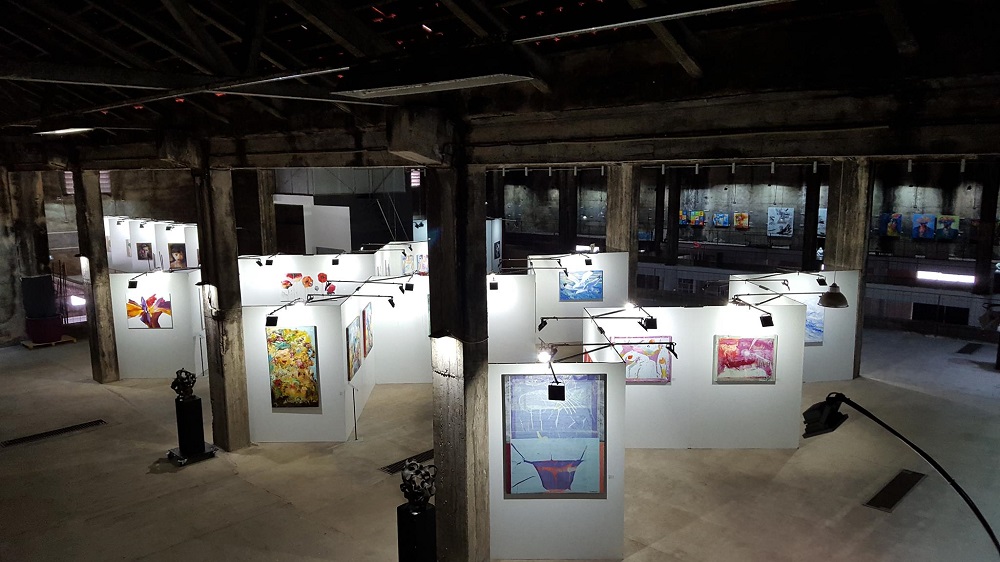 Lagoa Art Gallery “Lady in Red” moves to new location to “explore new creative possibilities”